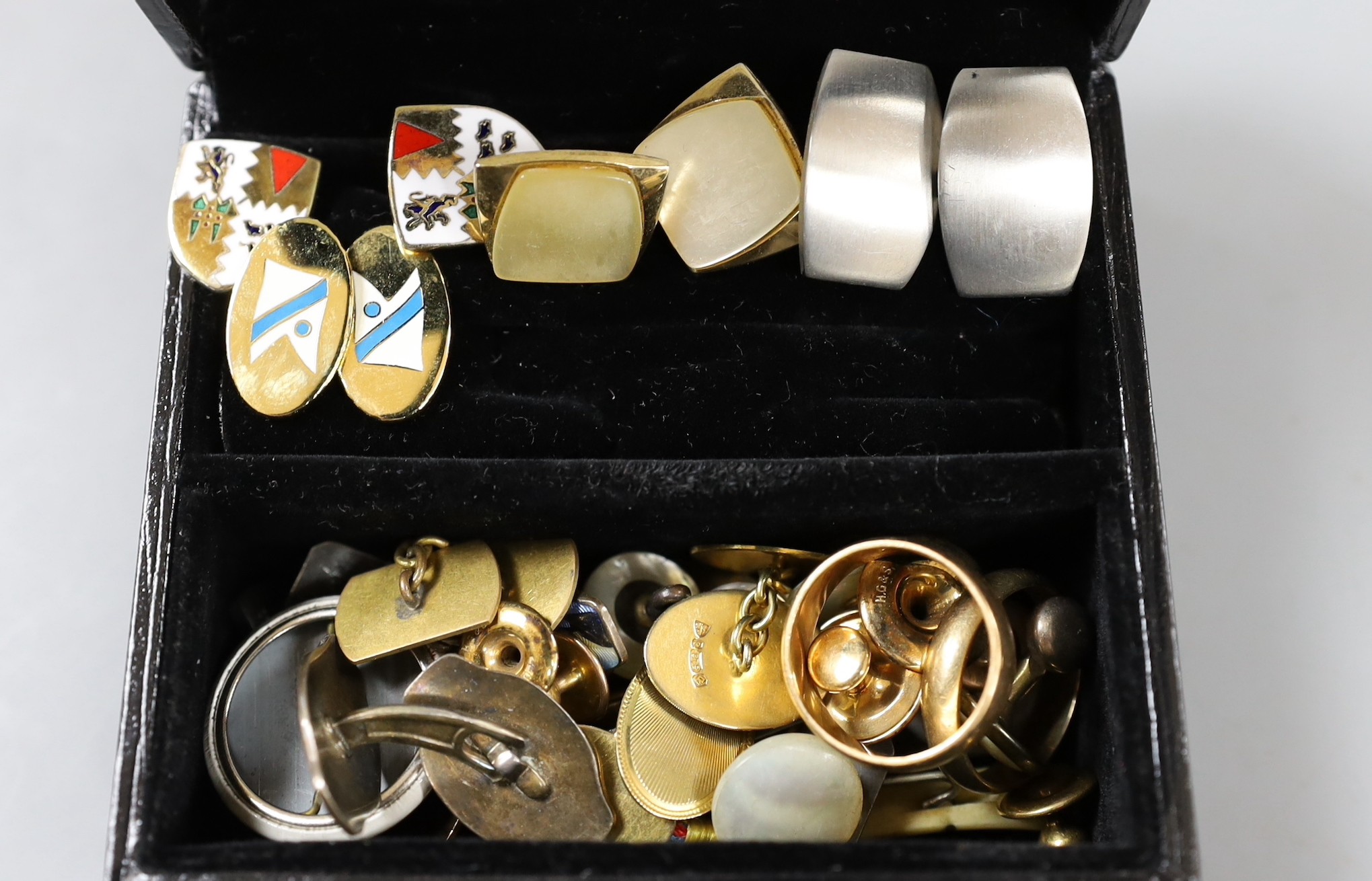 Two 9ct gold wedding bands, a pair of 9ct gold cufflinks, five assorted 9ct gold studs, 21.8 grams and other minor cufflinks, studs etc. including a pair of silver and enamel.